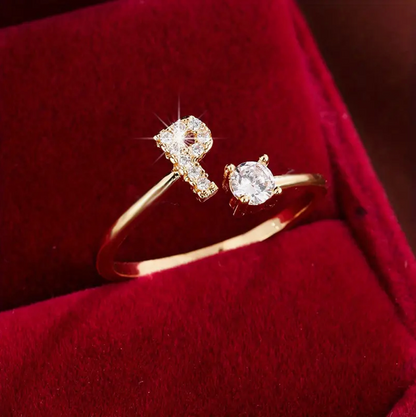 ゴールドとシルバーのジュエリー：エレガントなダイヤモンド文字リング