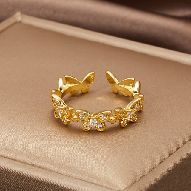 エレガントな蝶デザインの調節可能なゴールドリング
