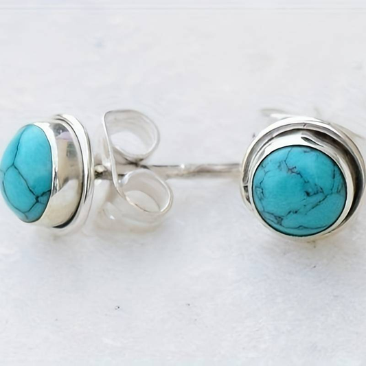 エレガントなヴィンテージの青い石と銀のデザインのイヤリング